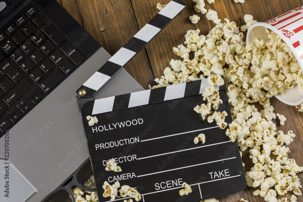 Fototapeta premium Popcorn and Laptop Playing Movie