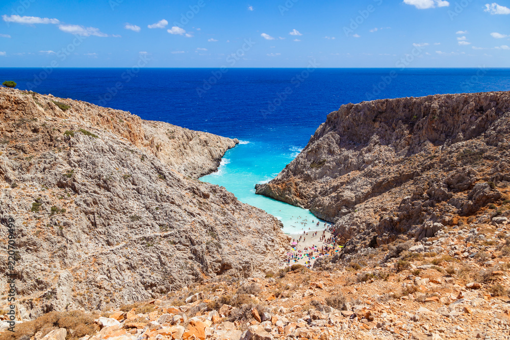 Scenic view on the exotic Stefanou beach (Seitan Limania) Akrotiri. Rocky beach with white sand and azure water. Stunning natural landscape. Island of Crete. Chania. Greece.