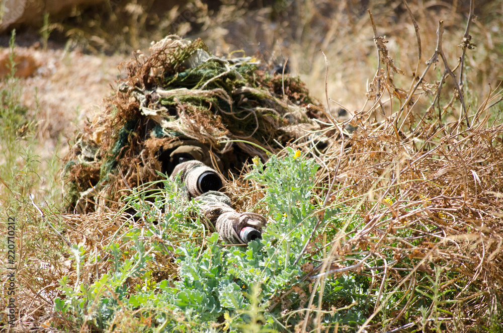 Sniper prone supported position Keep the body in line with the weapon bush  camouflage outside Stock Photo | Adobe Stock