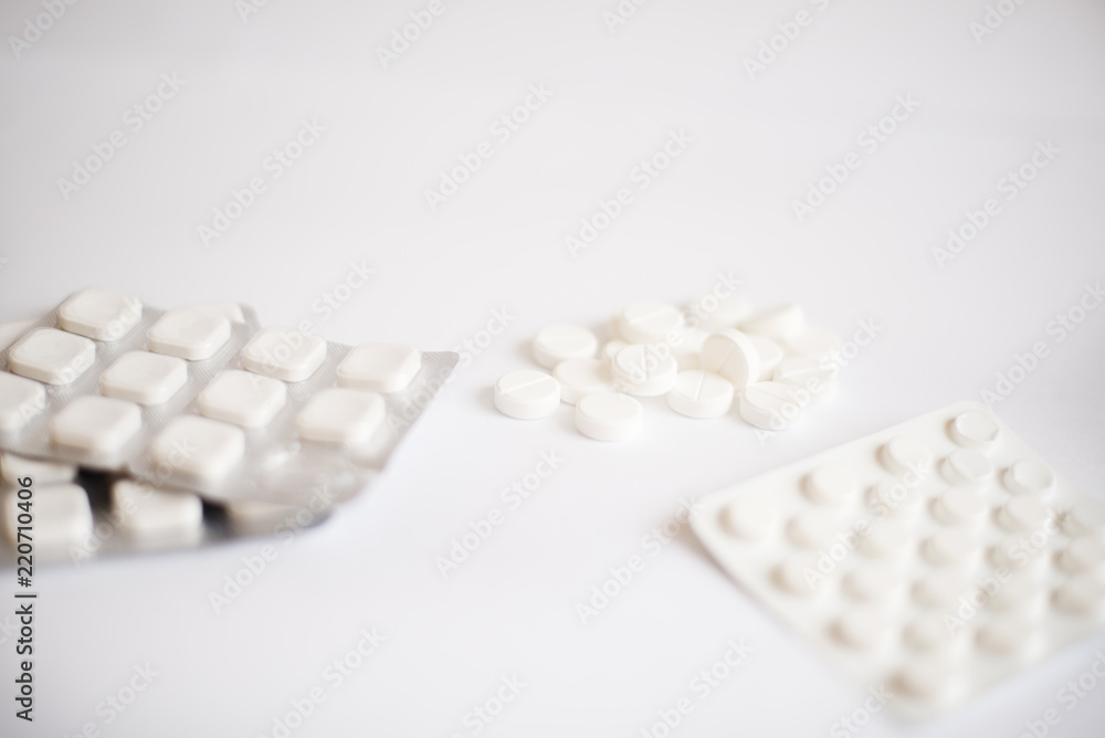 tablets in packages are on a white background tablets in packages are on a white background