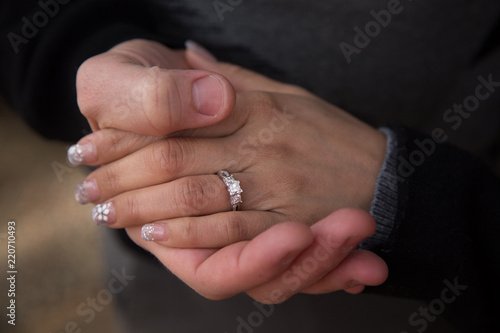 Hands of bride and groom