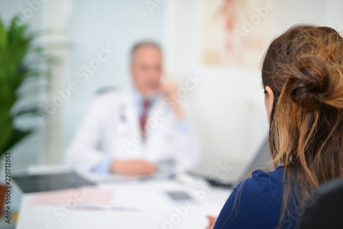 Fotografi Patient talking to a doctor
