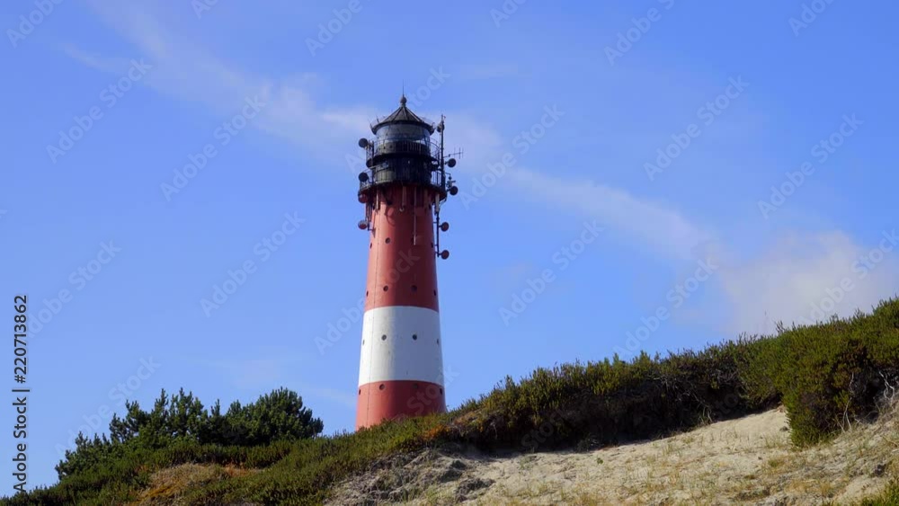 Wunderschöner Leuchtturm Hörnum Sylt mit Dünen Landschaft und blauen Himmel
Wunderschöner Leuchtturm Hörnum Sylt mit Dünen Landschaft und blauen Himmel