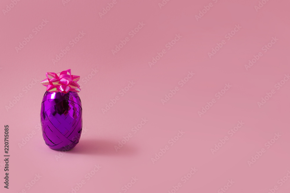 A creative original composition of a gift ribbon in the form of pineapple. A creative original composition of a gift ribbon in the form of pineapple.