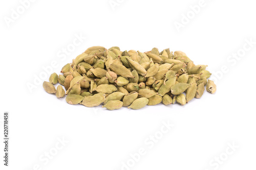 Pile of green Cardamom, cardamon or cardamum isolated on white background (dried fruits of Elettaria cardamomum)