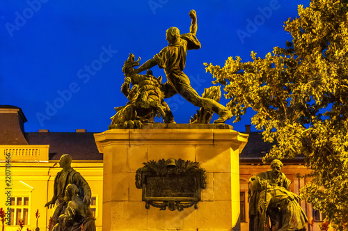 Historic statue at night in Nyiregyhaza, Hungary