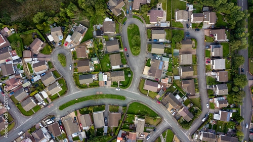 Top down aerial view of urban houses and streets in a residential area of a Welsh town