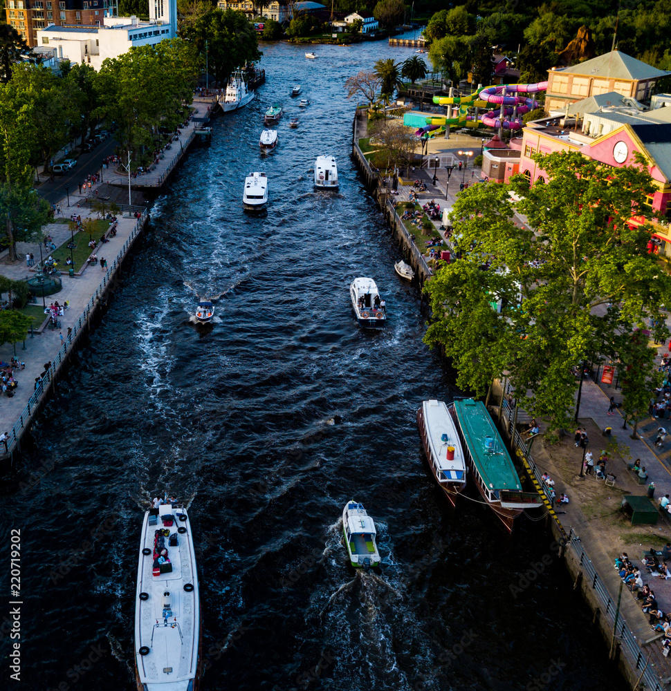 Boats on the Lujan River, Tigre, Buenos Aires, Argentina – Beautiful 4k  drone photos of boats at Tigre and Puerto de Frutos on a sunny afternoon in  the Capital City Stock Photo