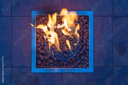 Gas fire place with gravel in a square