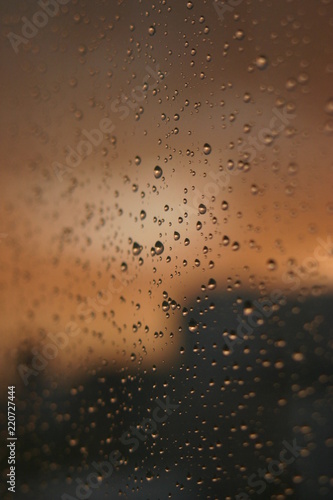 Texture detail of rain drop in window.