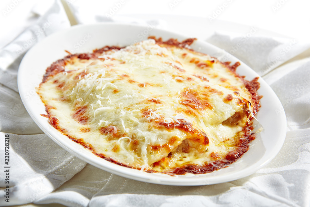 Cannelloni Pasta with Ricotta Isolated on White Background Cannelloni Pasta with Ricotta Isolated on White Background