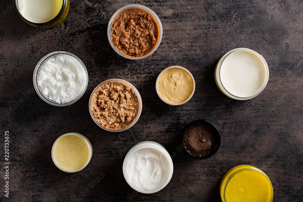 Different scrubs and body creams and cosmetics masks. Different scrubs and body creams and cosmetics masks.