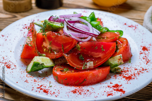 Vegetable salad with tomatoes and cucumbers