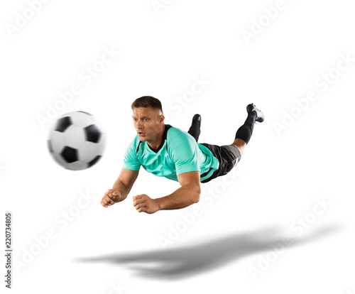 Fototapeta Naklejka Na Ścianę i Meble -  soccer player jumping for a header the isolated on white