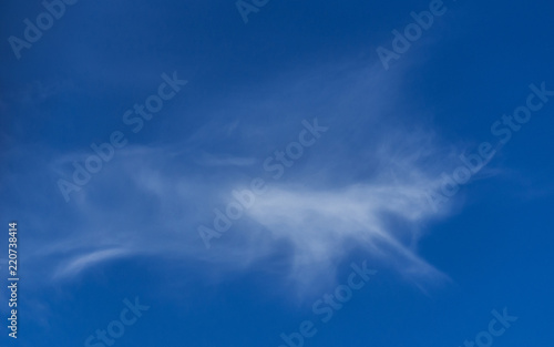 Fantasy Imagination Concept  Running Unicorn Shape White Cloud on Blue Sky Background.