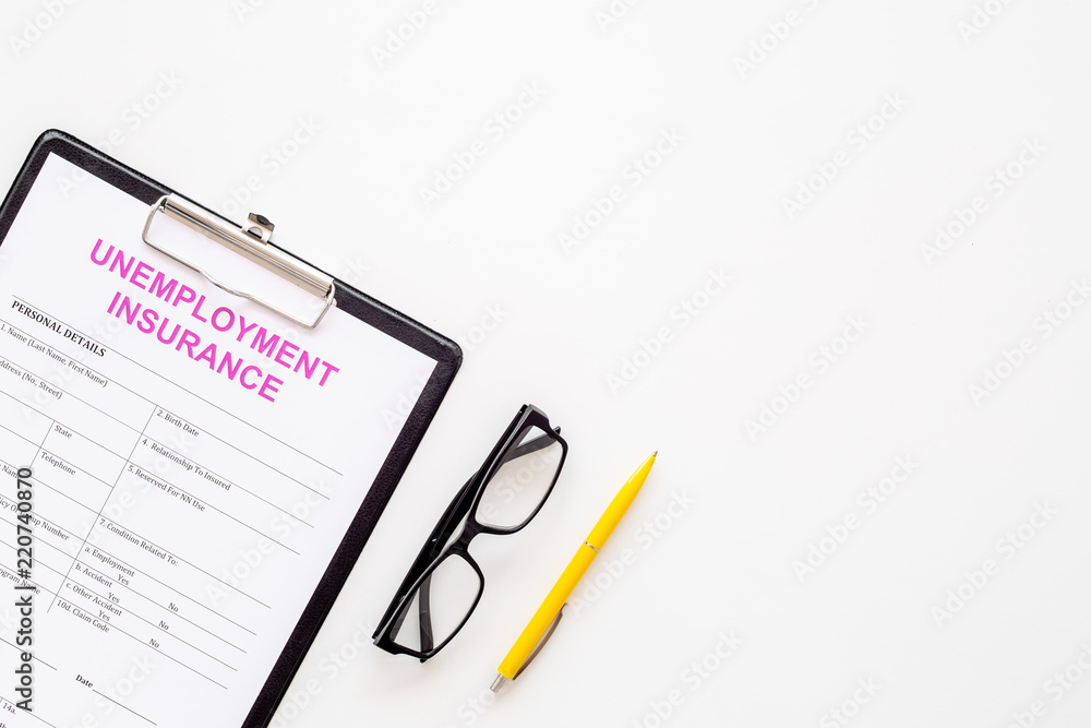 Unemployment insurance form on white background top view copy space
