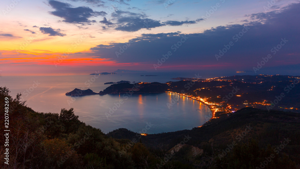 View from the hill to Agios Georgios bay with the long beach at Corfu island Greece