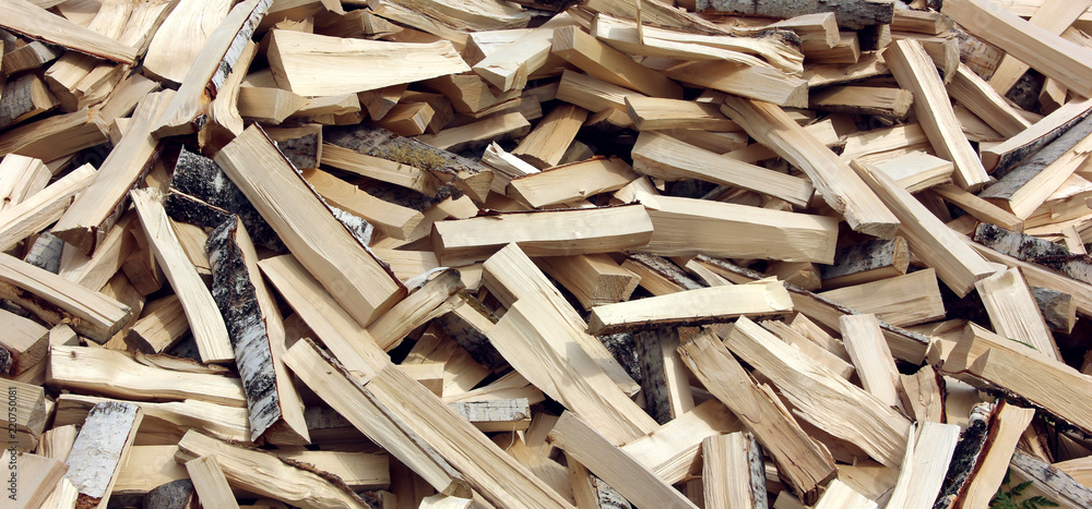 Pile of chopped fire wood prepared for winter. Pile of chopped fire wood prepared for winter.
