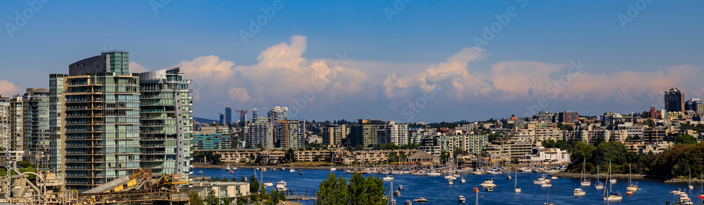 City skyline and waterfront on False Creek from Granville Bridge in Vancouver Canada