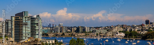City skyline and waterfront on False Creek from Granville Bridge in Vancouver Canada