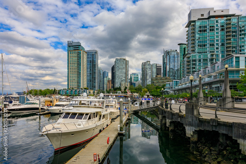 Coal Harbor in Vancouver British Columbia with downtown buildings boats and reflections in the water © SvetlanaSF