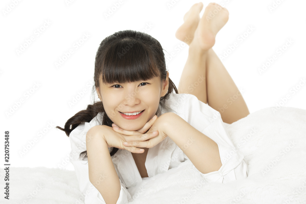Sexy Asian woman wearing a white shirt on white backround Sexy Asian woman wearing a white shirt on white backround