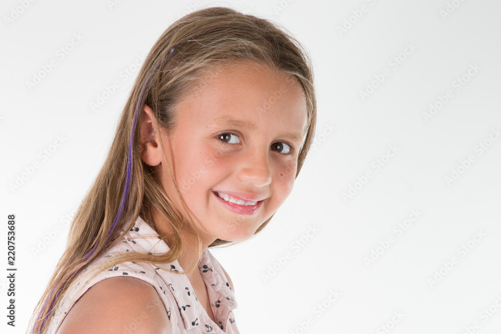 Cute smiling little girl portrait isolated on a white Cute smiling little girl portrait isolated on a white
