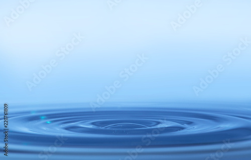 blue rings on a water surface