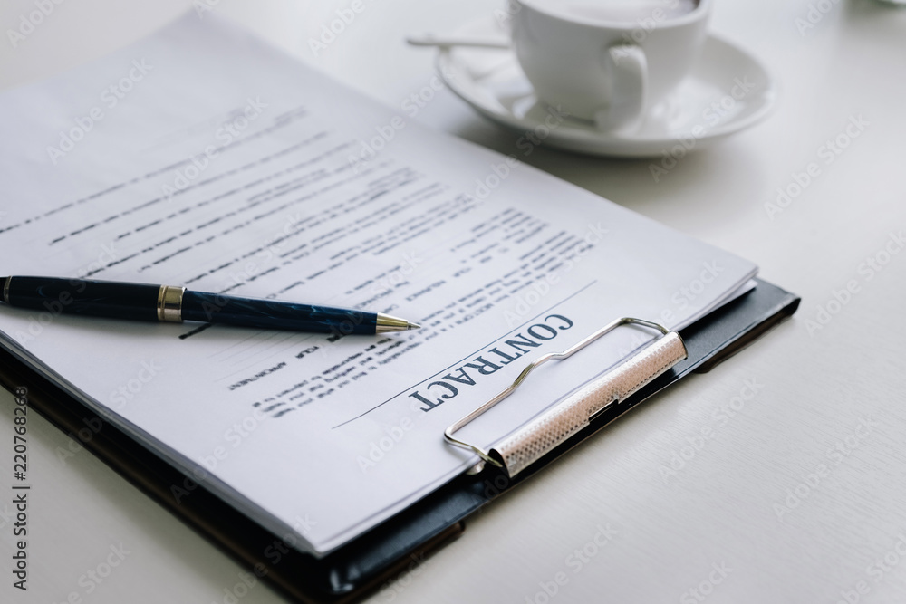 Contract application and pen to Signing of Business Agreement. Contract application and pen to Signing of Business Agreement.
