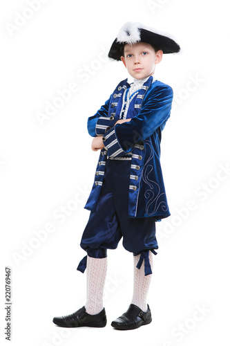 Little boy posing in musketeer costume