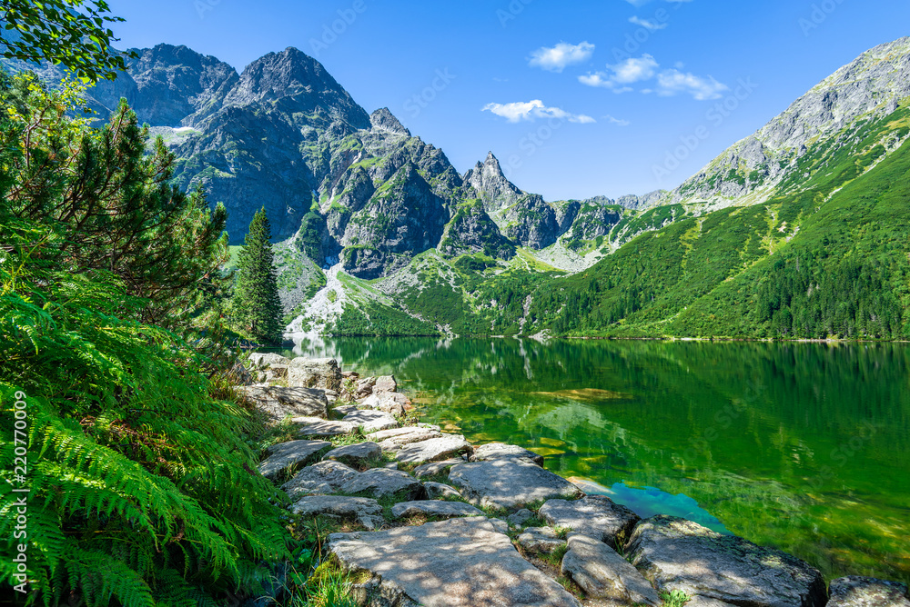 Green water lake Morskie Oko, Tatra Mountains, Poland - obrazy, fototapety, plakaty 