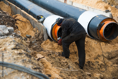 Laying new pipes in the trench