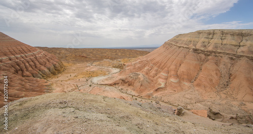 Bild auf Leinwand summer sunny panorama of the valley of desert mountains, Kazakhstan, Altyn-Emel
