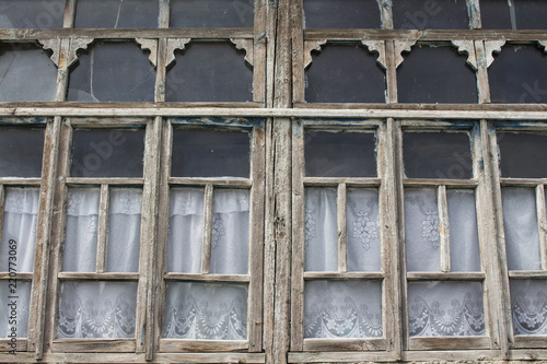 Vintage windows with curtains