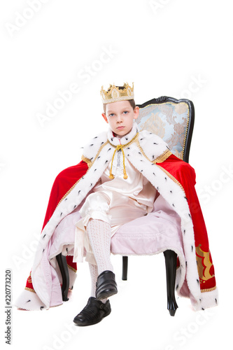 Cute boy wearing costume of a king