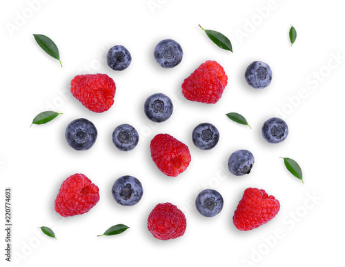 blueberries and raspberries with green leaf solated on white background  top view  flat lay