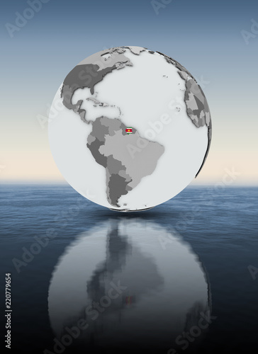 Suriname on globe above water