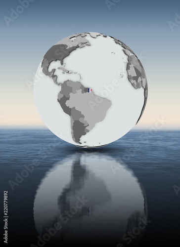 French Guiana on globe above water