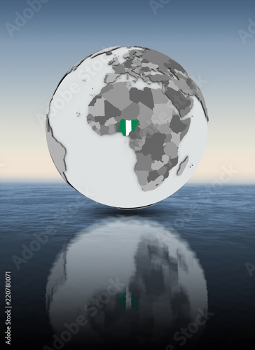 Fototapeta Naklejka Na Ścianę i Meble -  Nigeria on globe above water