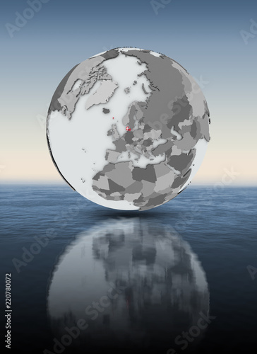 Denmark on globe above water