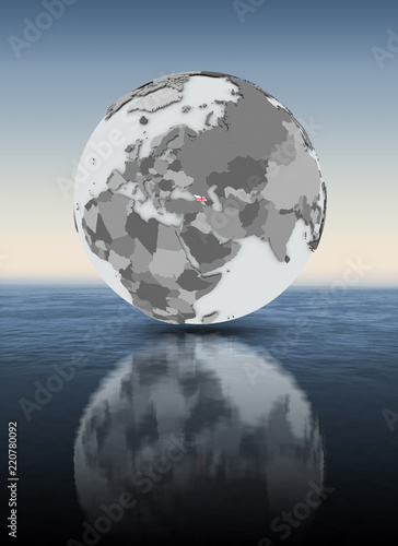 Georgia on globe above water