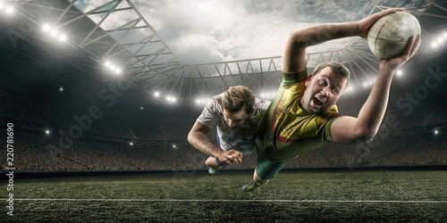 Dwóch mężczyzn Rugby walczy o piłkę w locie na profesjonalnym stadionie rugby