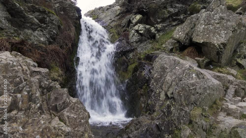 Lightspout waterfall on a cloudy day by Carding Mill Valley in the Shropshire hills Area of Outstanding Natural Beauty, England Lightspout waterfall on a cloudy day by Carding Mill Valley in the Shropshire hills Area of Outstanding Natural Beauty, England