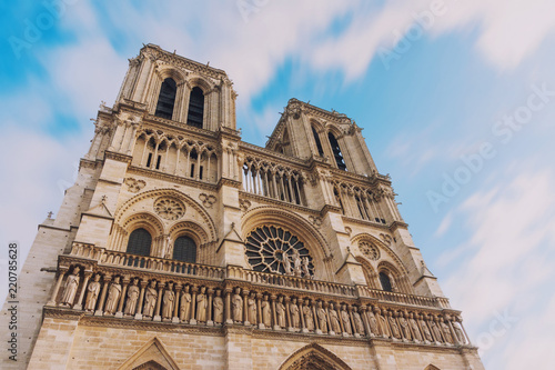 Notre Dame de Paris, amazing medieval cathedral church, one of the most famous tourist attraction in France, long exposure shot photo