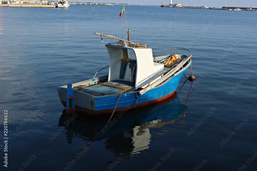 Italy, Sicily: Old boat in Marsala harbour. Italy, Sicily: Old boat in Marsala harbour.
