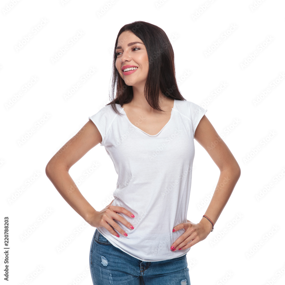 portrait of confident woman in white t-shirt looking to side portrait of confident woman in white t-shirt looking to side