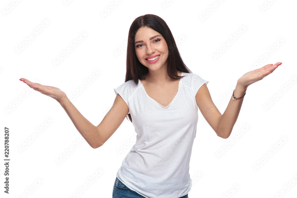 portrait of smiling woman making an inviting gesture portrait of smiling woman making an inviting gesture