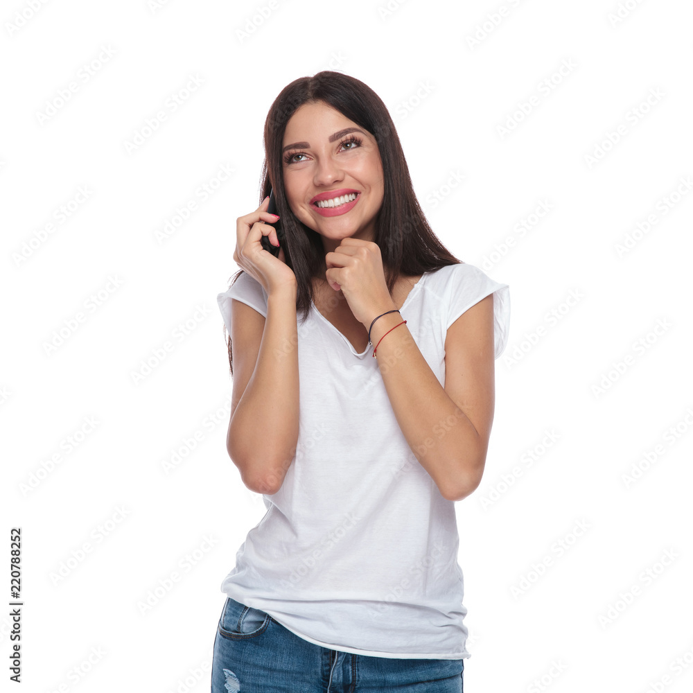 portrait of pensive brunette girl talking on the phone portrait of pensive brunette girl talking on the phone