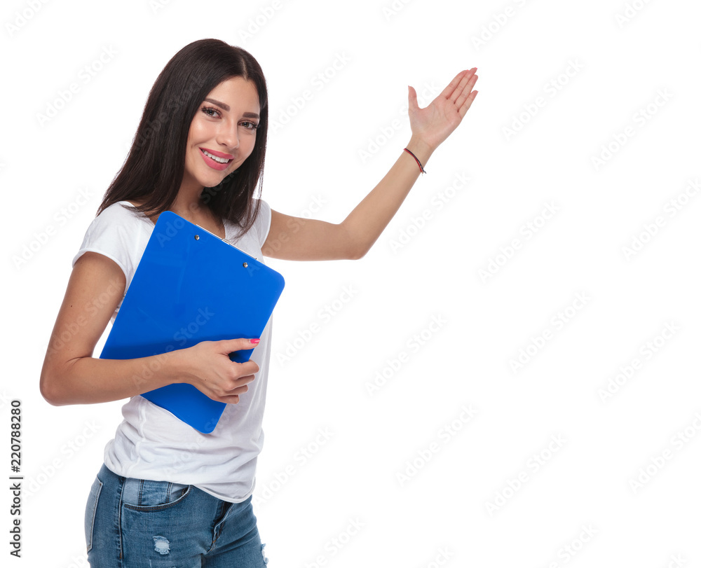 woman in white t-shirt hold clipboard while inviting woman in white t-shirt hold clipboard while inviting