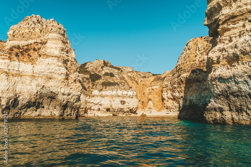 Rocks, Cliffs And Ocean Landscape At Lagos Bay Coast In Algarve, Portugal